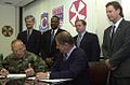 Image 47National Federation of Federal Employees officials sign a collective bargaining agreement with the U.S. 8th Army in October 2002.