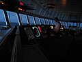 On the bridge of the Celebrity Constellation at night.