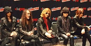 X Japan at New York Comic Con in 2014. From left to right: Heath, Pata, Yoshiki, Toshi, and Sugizo.