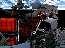 Astronaut Fei Junlong performing spacewalk on Tiangong Space Station