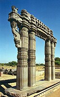 Kakatiya Kala Thoranam (Warangal Gate) built by the Kakatiya dynasty in ruins; one of the many temple complexes destroyed by the Delhi Sultanate.[30]