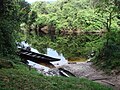 A canoe (Canoa), which serves as a transport for many locals and visitors