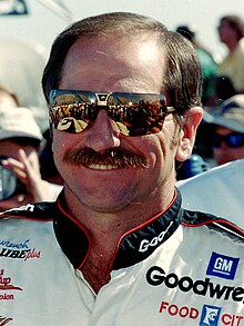 An image of late NASCAR driver Dale Earnhardt wearing Sunglasses