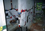 Men's toilet designed by artist and architect Hundertwasser