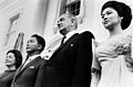 President Lyndon B. Johnson and Lady Bird Johnson seen standing alongside Philippines President Ferdinand Marcos and Philippines First Lady Imelda Marcos during a state arrival ceremony, 1966.