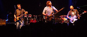 moe. tuning their instruments between songs on March 3, 2007. Left to right: Jim Loughlin, Chuck Garvey, Rob Derhak, Vinnie Amico, Al Schnier.