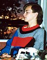 Swedish teenager with mullet haircut and abstract jumper, 1991.