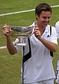 Image 11Todd Woodbridge holding the Gentlemen's doubles silver challenge cup in 2004 (from Wimbledon Championships)