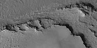 Close view of layers under ejecta surface of pedestal crater, as seen by HiRISE under HiWish program