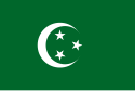 Green flag with a white crescent containing three five-pointed white stars.