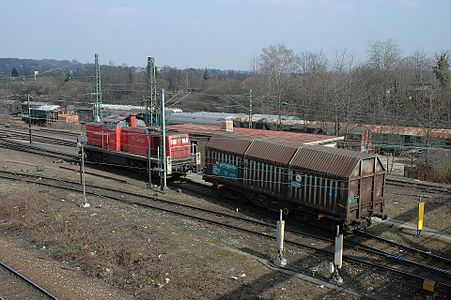 A switcher locomotive pushing a car over the hump at Kornwestheim yard