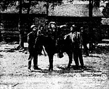 TheFuedGirl-1916-scene-newspaper.jpg