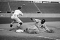 Image 10 Ty Cobb Photo: National Photo Company; restoration: Lise Broer; crop: jjron Ty Cobb (1886–1961), shown here sliding into third base on August 16, 1924, was an American Major League Baseball (MLB) outfielder. He spent twenty-two seasons with the Detroit Tigers, including six as the team's player-manager, and finished his career with the Philadelphia Athletics. During this time Cobb set ninety MLB records, though his abilities were sometimes overshadowed by his surly temperament and aggressive playing style. In 1936 Cobb was made an inaugural member of the Baseball Hall of Fame, and in 1999 editors at the Sporting News ranked him third on their list of "Baseball's 100 Greatest Players". More selected pictures