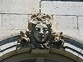 One of six mascarons which adorn the logis