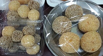 Onde-onde from Surabaya, Indonesia. The yellow ones were made from white glutinous rice flour while the black ones from black glutinous rice flour.