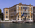 The Palazzo Cavalli-Franchetti is an example of Venetian Gothic architecture alongside the Grand Canal.