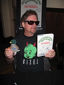 Robbins at a reading of Wild Ducks Flying Backward in San Francisco in 2005