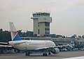 An old photo of a Croatia Airlines aircraft and tower