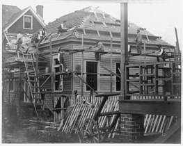 A simple putlog type scaffolding and roof brackets.