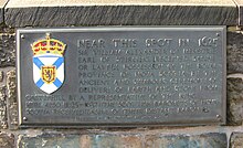 Photo of a bronze plaque