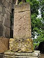 Khachkar of the 13th century next to the southern door of the church