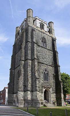 A big rugged tower with buttresses