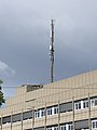 Cell tower from Deutsche Telekom on top of a building in Karlsruhe, Germany