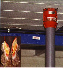 A passive fire protection example of an intumescent with strong expansion pressure. This intumescent is called Palusol. It is based on waterproofed sodium silicate. Another high-expansion intumescent popular for use in plastic pipe firestop devices is graphite. Graphite tends to be less affected by atmospheric conditions than many water-bearing intumescents.