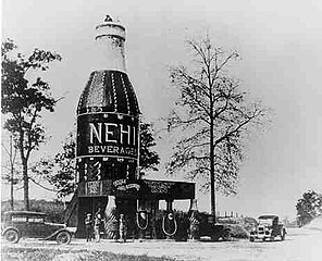 A 64-foot-tall (20 m) Nehi Bottle located near Auburn, Alabama, in an area referred to as "The Bottle" (destroyed by fire in 1933)