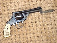 H&R Revolver of Top-Break design with knife