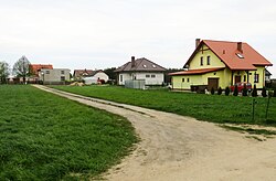 Houses by the roadside in Kruszynki