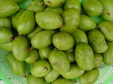 Photo of dozens of green fruits