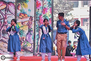 Students performing at cultural event