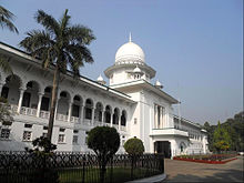 Long, white, domed building