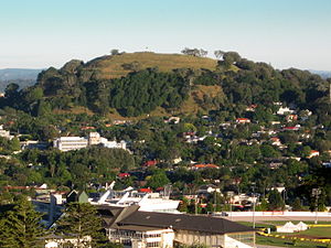 Mount Eden looming high above suburban Epsom viewed from Maungakiekie / One Tree Hill