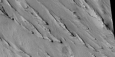 Yardangs, as seen by HiRISE under HiWish program. Location is near Gordii Dorsum in the Amazonis quadrangle. Note: this is an enlargement of previous image.