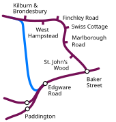 A line is shown at the bottom, from right to left, with stations at Baker Street, Edgware Road and junction before two Paddington stations. From Baker Street a line is shown going north through several stations before turning left. From Edgware Road a line in a contrasting colour is shown, going north bypassing these stations before joining the line from Baker Street just north of Kilburn & Brondesbury.