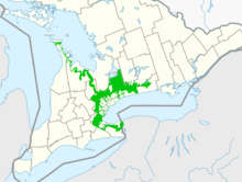 A map shows Southwestern Ontario, with a small ring of green around the cities of Toronto and Hamilton, denoting areas unsuitable for development