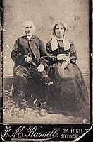 Nineteenth-century British couple. The lady is wearing lappets hanging down on each side of her neck.