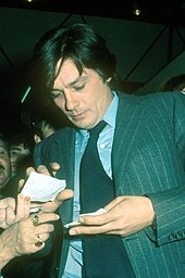 Delon giving out autographs, 1971