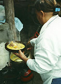 Locro being served at Simoca market, Argentina