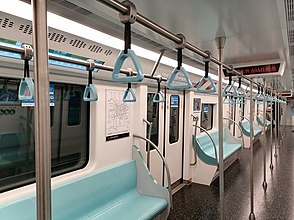 Light blue seats and dark floors.