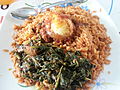 Image 12Jollof rice with vegetables and a boiled egg (from Malian cuisine)