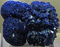 Azurite, common in Europe and Asia, is produced by the weathering of copper ore deposits. It was crushed and powdered and used as a pigment from ancient times,