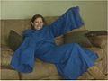 Woman in a "Snuggie blanket"