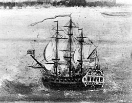 A sail warship at sea flying a US flag.