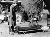 Two American Red Cross nurses demonstrating treatment practices during the influenza pandemic of 1918.