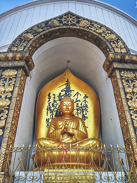 File:Buddha statue shanti stupa.jpg