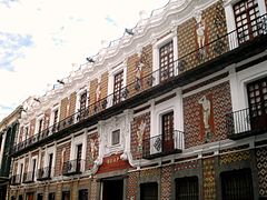 The Baroque Casa de los Muñecos in the Historic Centre of Puebla, with a facade incorporating a Talavera mosaic