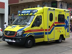 Hong Kong Fire Service ambulance, in its updated yellow livery